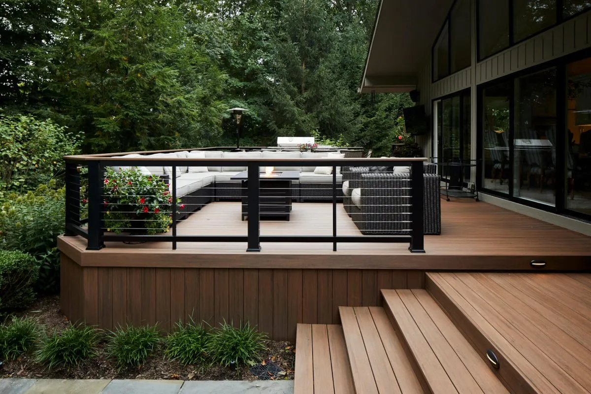 Beautiful garden patio using composite decking - elements in english walnut - Composite Prime